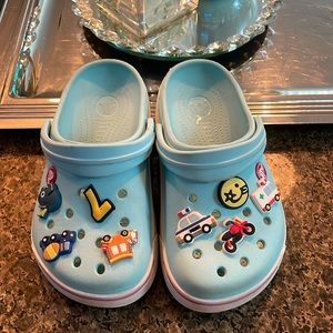 Kids Crocs size J1. Beautiful blue/teal color